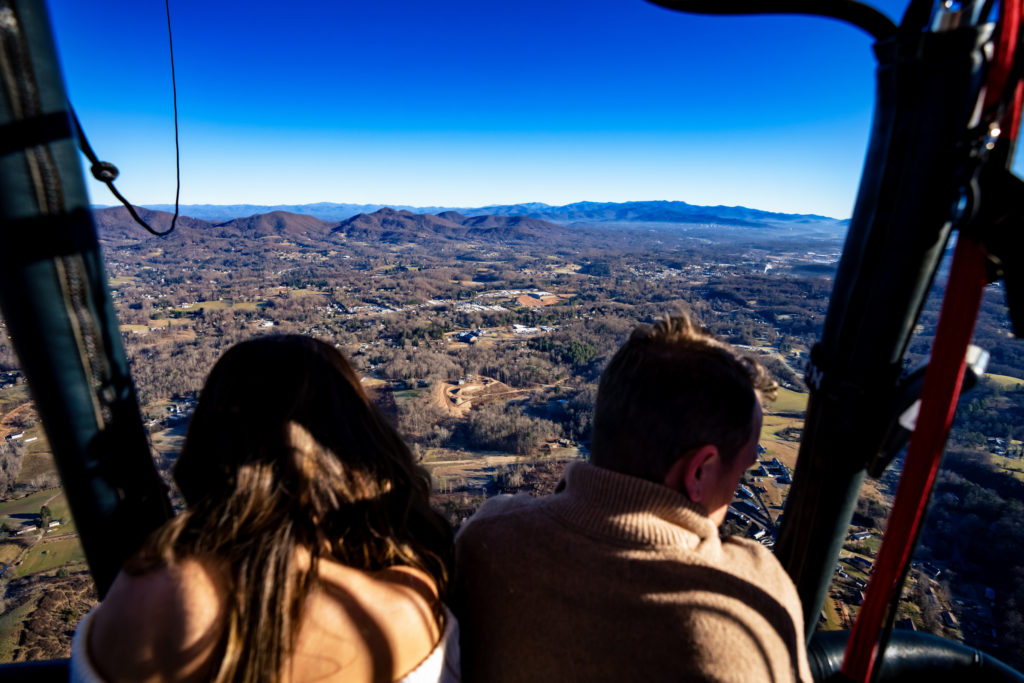 Bride & groom seeing for miles in hot air balloon ride engagement session by Nathan Whitworth Greenville SC Wedding Photography